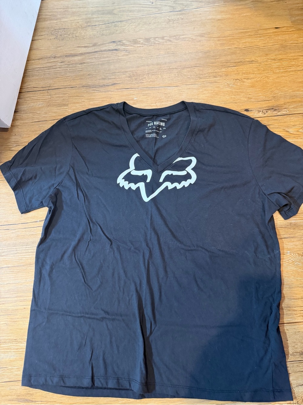 Fox Women’s Black V-Neck Tee with Light Logo